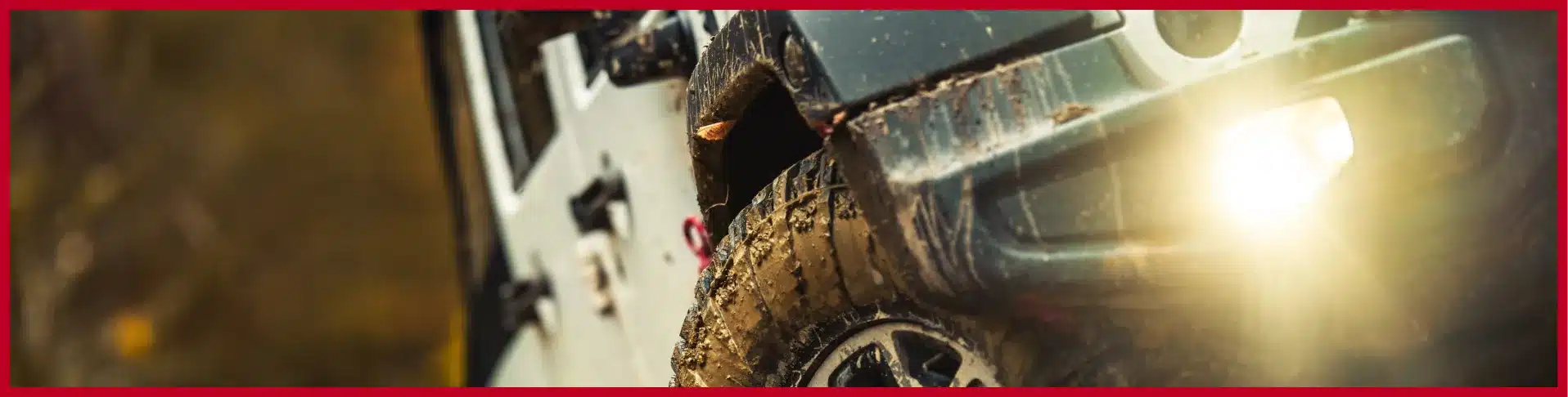 close up of a mud covered car tire