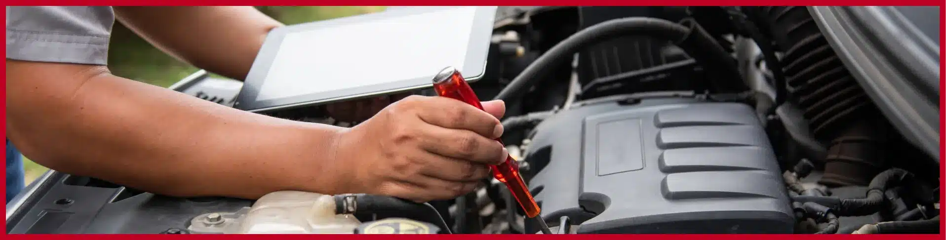 Mechanic conducting preventative vehicle maintenance at E-Motive Performance Mertztown PA