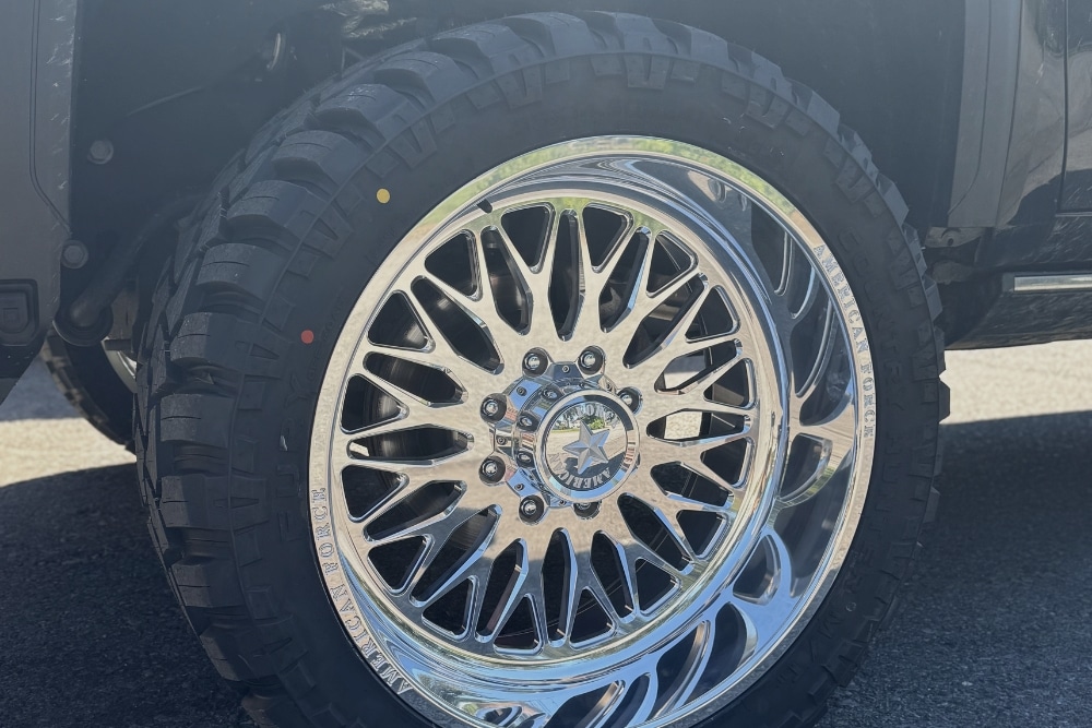Wheel and Tire Setup In Mertztown, PA At E-Motive Performance & Auto Repair. Close-up view of a vehicle tire.