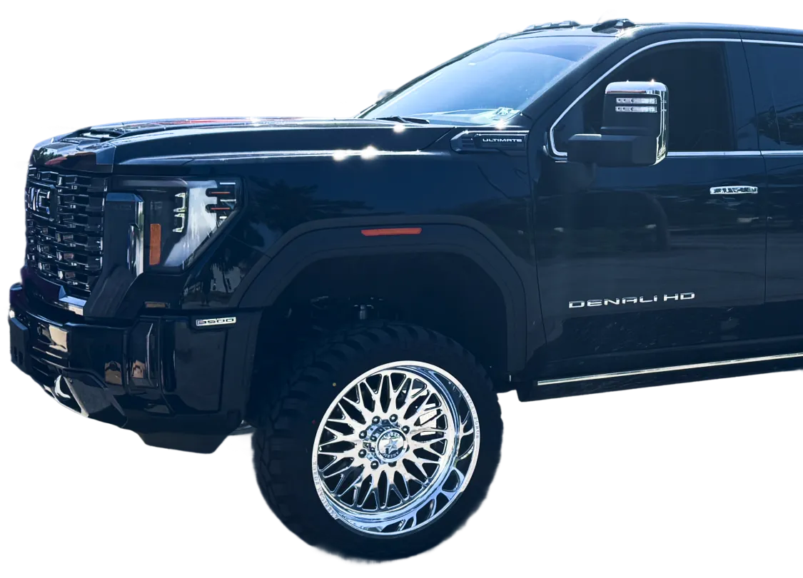 a black truck with silver rims