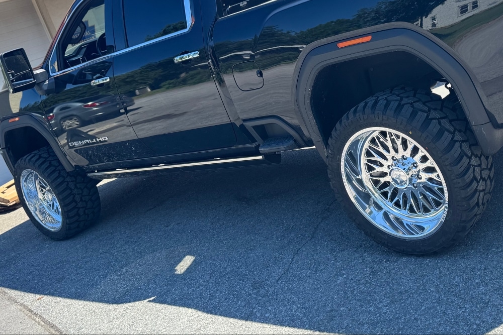 Custom Wheel Upgrade in Mertztown PA At E-Motive Performance & Auto Repair. Truck parked outside auto shop and featuring custom wheels.