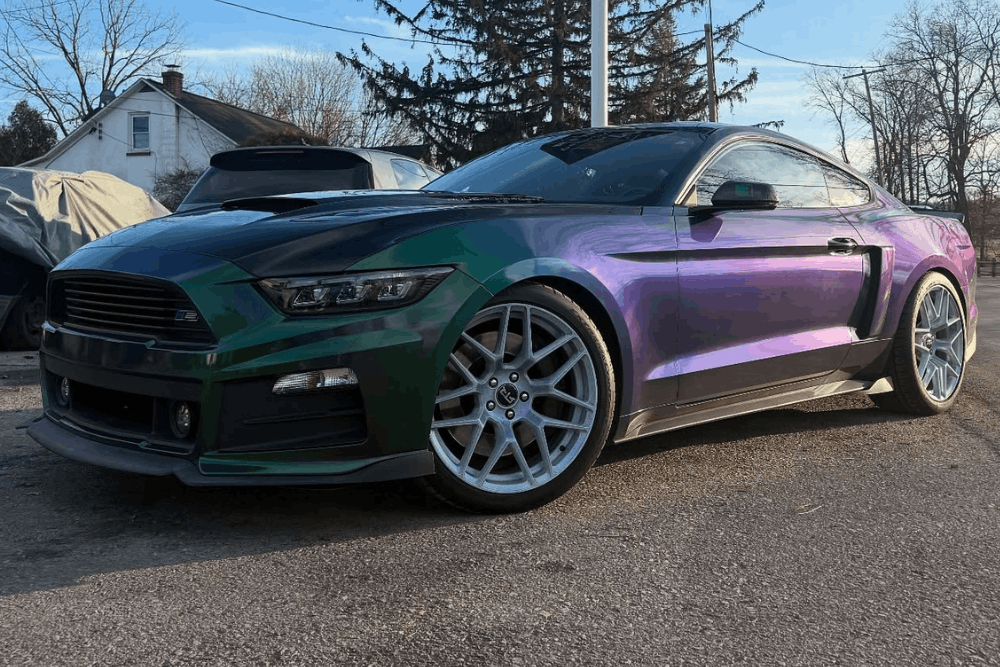 Lowered car maintenance in Mertztown, PA, at E-Motive Performance & Auto Repair. Image of a customized lowered Ford Mustang featuring performance upgrades and aftermarket wheels, highlighting professional suspension maintenance, alignment services, and performance vehicle care.